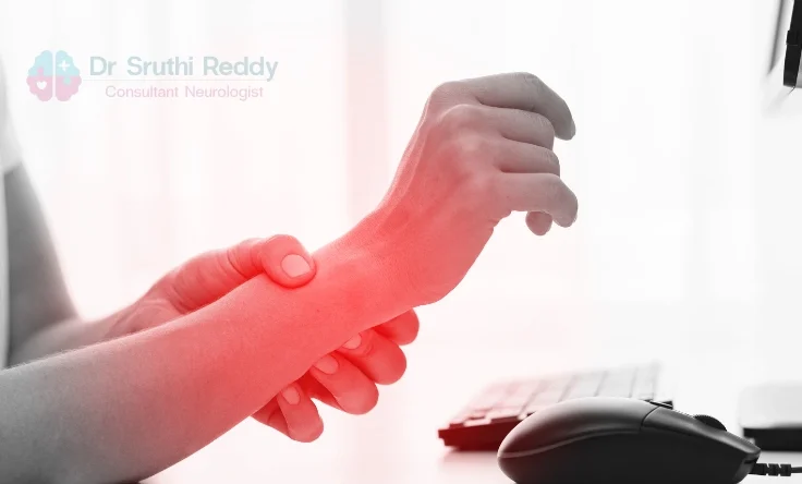 Doctor evaluating a patient’s hand for carpal tunnel and nerve compression symptoms.